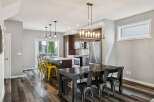 Experience modern living in this open-concept kitchen and dining area, perfect for entertaining.