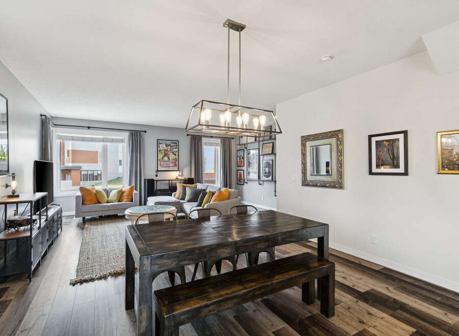 Experience modern living in this spacious open-concept dining and living area, perfect for entertaining.