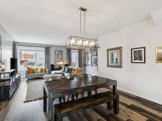 Experience modern living in this spacious open-concept dining and living area, perfect for entertaining.