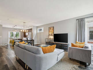 Experience modern living in this open-concept home featuring a spacious living area perfect for entertaining.