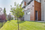 Discover modern living in this stunning property featuring sleek architectural design and natural wood accents.
