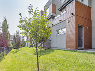 Discover modern living in this stunning property featuring sleek architectural design and natural wood accents.