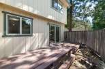Enjoy outdoor living on this spacious wooden deck, perfect for entertaining or relaxing in the fresh air.