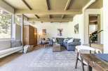 Experience cozy living in this inviting living room, featuring a plush sectional sofa perfect for relaxation.