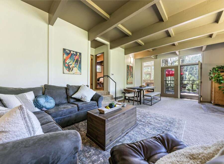 Experience the perfect blend of rustic charm and modern comfort in this inviting living space.