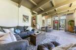 Experience the perfect blend of rustic charm and modern comfort in this inviting living space.