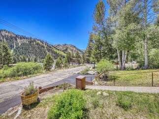 Nestled amidst a picturesque mountain landscape, this property offers a serene escape with stunning natural beauty.