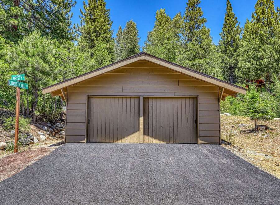 Discover this charming property featuring a spacious two-car garage, perfect for vehicle storage or a workshop.