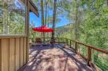 Enjoy the serene mountain views from this charming deck, perfect for outdoor relaxation and entertaining.