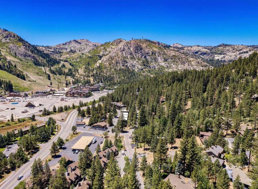 Discover this stunning mountain retreat nestled amidst towering pine trees and offering breathtaking views of the surrounding peaks.