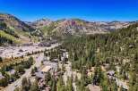 Discover this stunning mountain retreat nestled amidst towering pine trees and offering breathtaking views of the surrounding peaks.