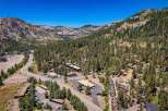 Discover this stunning mountain property nestled amidst a lush pine forest, offering breathtaking views and a serene escape.
