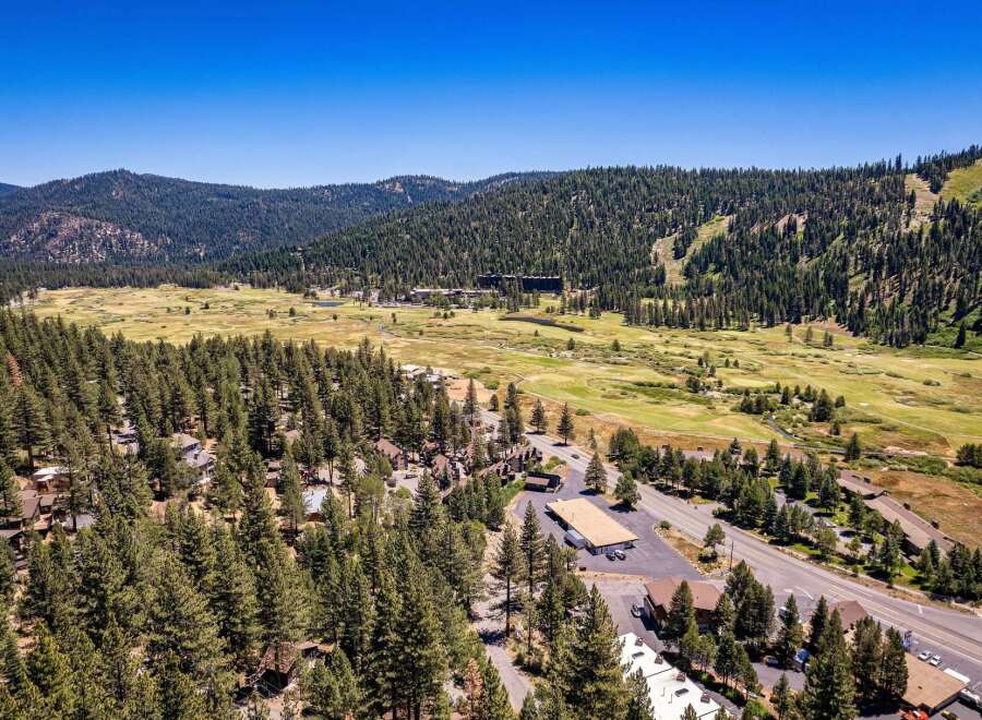 Discover this stunning property nestled amidst a lush pine forest, offering breathtaking mountain and valley views.