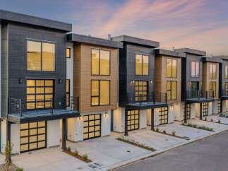 Discover modern living in these stunning townhomes featuring sleek architectural design and premium finishes.