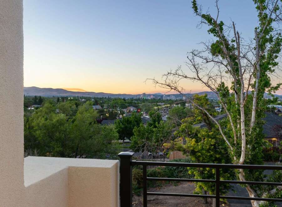 Experience breathtaking sunset views over the city skyline and rolling hills from this elevated vantage point.