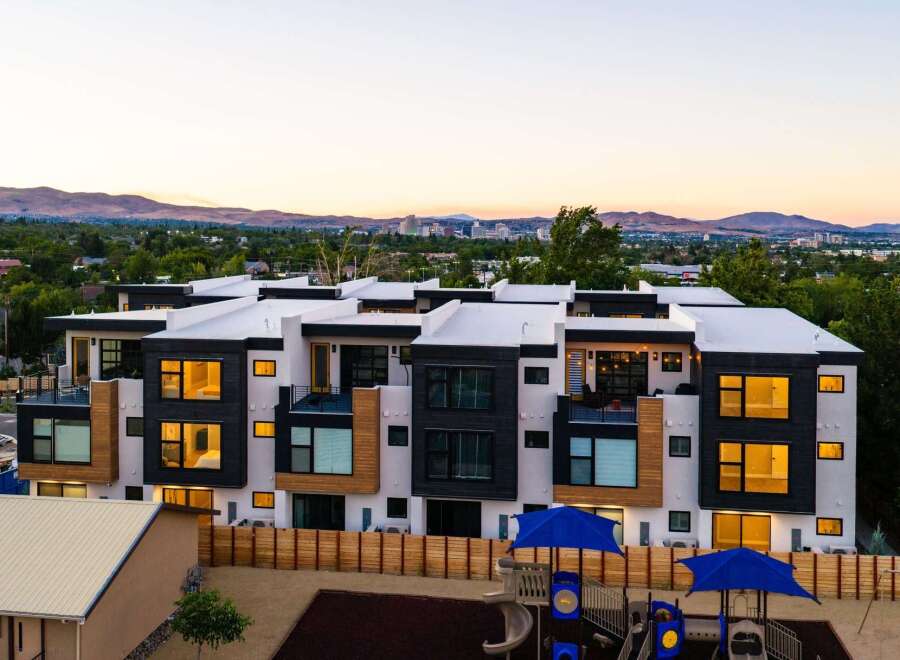Discover modern living in this stunning multi-unit property, featuring sleek architecture and spacious interiors.