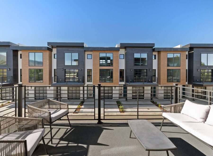 Experience modern living in this stunning townhouse complex featuring sleek architectural design and premium finishes.