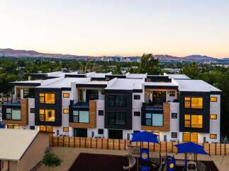 Discover modern living in this stunning multi-unit property, featuring sleek architecture and spacious interiors.
