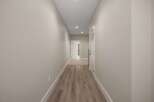 Step into this inviting hallway featuring a neutral color palette and modern finishes.