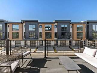 Experience modern living in this stunning townhouse complex featuring sleek architectural design and premium finishes.