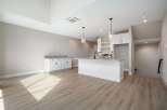Experience modern living in this stunning open-concept kitchen and living area.