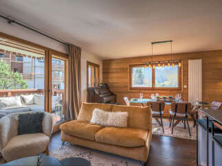 Experience luxurious alpine living in this beautifully appointed living and dining area.