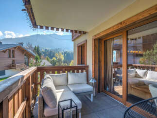 Enjoy breathtaking mountain views from this charming balcony, perfect for morning coffee or evening relaxation.