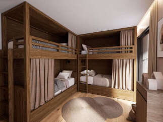 This charming bedroom features a space-saving L-shaped bunk bed design, perfect for maximizing room capacity.