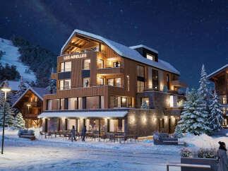 Experience luxury mountain living at Les Airelles, a stunning ski resort property nestled amidst snow-covered pines and a starry night sky.