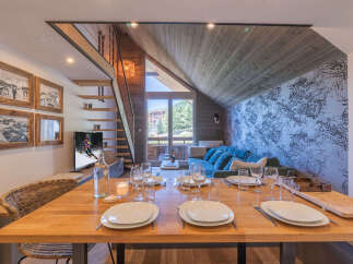 Experience cozy mountain living in this charming dining area, perfect for family meals or entertaining guests.