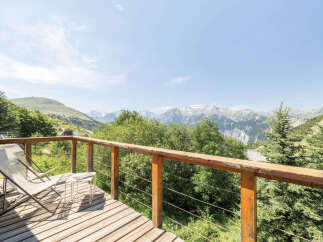 Enjoy breathtaking mountain views from this charming balcony, perfect for your morning coffee or evening relaxation.