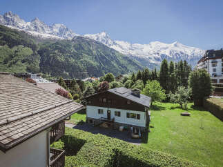 Experience breathtaking mountain views from this charming property nestled in a serene alpine setting.