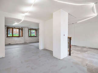 Discover this unfinished interior space, perfect for customization and renovation.