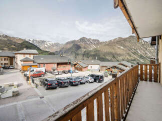 Experience the charm of mountain living with this picturesque property offering stunning views of snow-capped peaks.