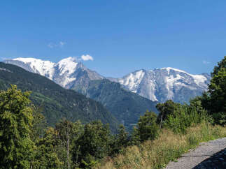 Experience breathtaking mountain views from this stunning property, featuring snow-capped peaks and lush green slopes.