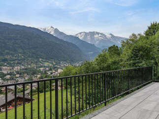 Experience breathtaking mountain views from this stunning property's expansive balcony.