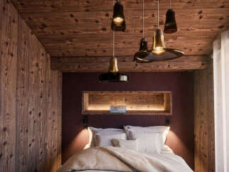 Experience rustic charm and modern comfort in this beautifully appointed bedroom.