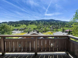 Experience breathtaking mountain views from this charming wooden balcony, perfect for enjoying your morning coffee or evening sunset.