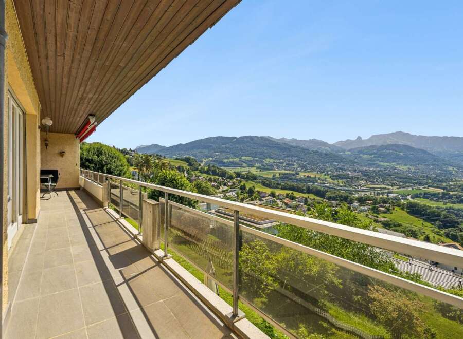 Experience breathtaking panoramic views from this stunning balcony, perfect for enjoying your morning coffee or evening relaxation.