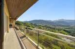 Experience breathtaking panoramic views from this stunning balcony, perfect for enjoying your morning coffee or evening relaxation.