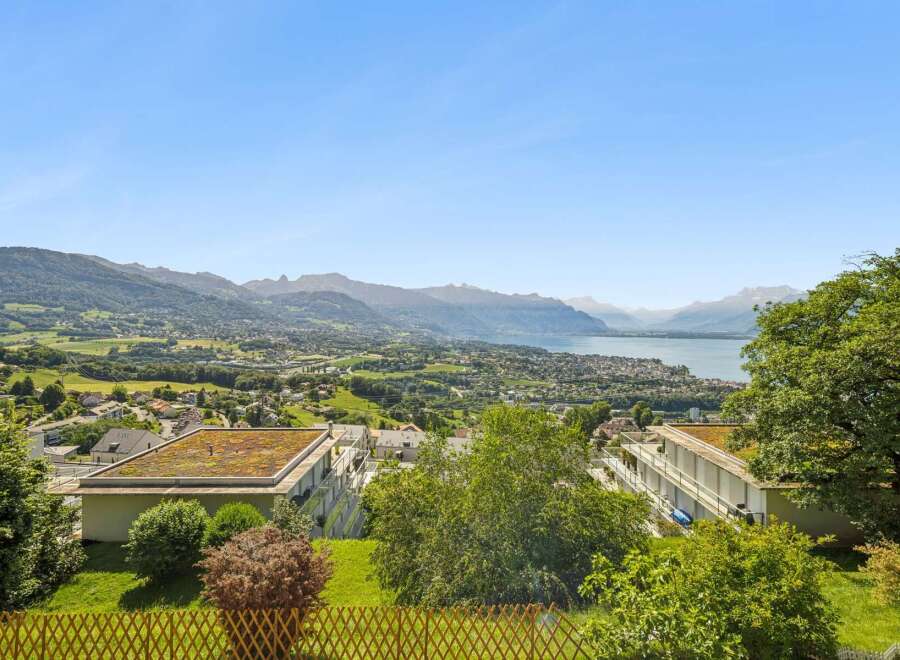 Experience breathtaking panoramic views of the lake and mountains from this stunning property.