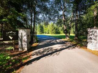 Welcome to Solitude Point, a stunning property offering unparalleled privacy and natural beauty.
