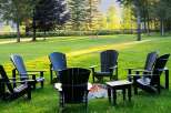 Experience serene outdoor living with this inviting fire pit area, perfect for gathering with loved ones.