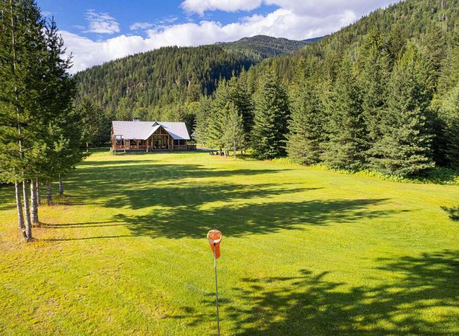Experience serene living in this stunning property nestled amidst lush greenery and majestic mountains.
