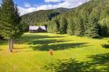 Experience serene living in this stunning property nestled amidst lush greenery and majestic mountains.