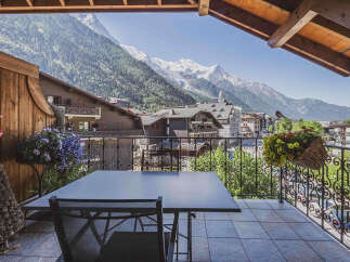 Enjoy breathtaking mountain views from this charming balcony, perfect for your morning coffee or evening relaxation.