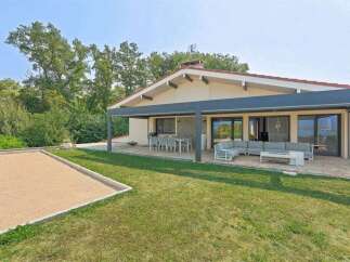Experience luxurious outdoor living with this stunning property featuring a spacious covered patio perfect for al fresco dining and relaxation.
