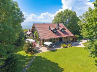 Discover this charming property nestled amidst lush greenery, offering breathtaking panoramic views.