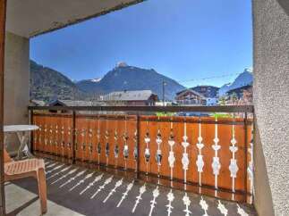 Enjoy breathtaking mountain views from this charming balcony, perfect for your morning coffee or evening relaxation.