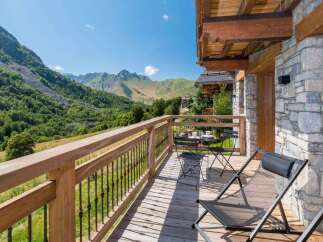 Enjoy breathtaking mountain views from this charming balcony, perfect for your morning coffee or evening relaxation.